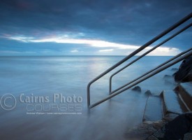 Image of sea mist rolling over coastal steps, Cairns, North Queensland, Australia