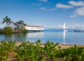 Image of sailing boat passing Sugar Wharf, Port Douglas, North Queensland, Australia