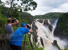 Image of photographers overlooking Barron Falls in wet season, Cairns, North Queensland, Australia