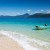 Image of zodiac floating in clear waters of Nudey Beach on Fitzroy Island, Cairns, North Queensland, Australia