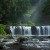 Image of sunlight illuminating Nandroya Falls, Atherton Tablelands, North Queensland, Australia