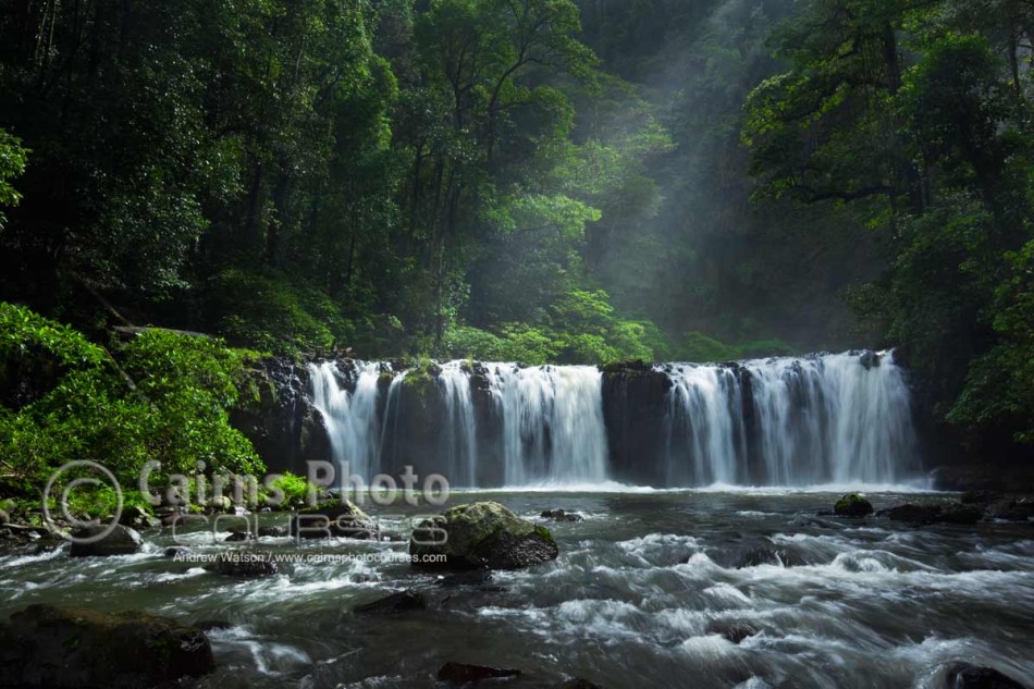 Image of sunlight illuminating Nandroya Falls, Atherton Tablelands, North Queensland, Australia