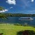 Image of tour boat crossing scenic Lake Barrine, Atherton Tablelands, North Queensland, Australia