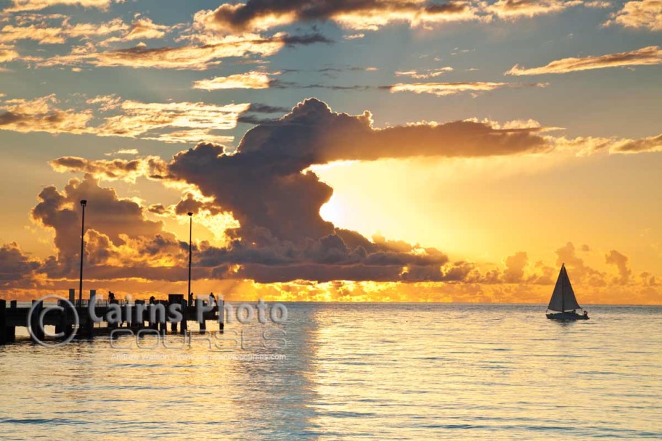 Image of sailboat and Palm Cove jetty at dawn, Cairns, North Queensland, Australia