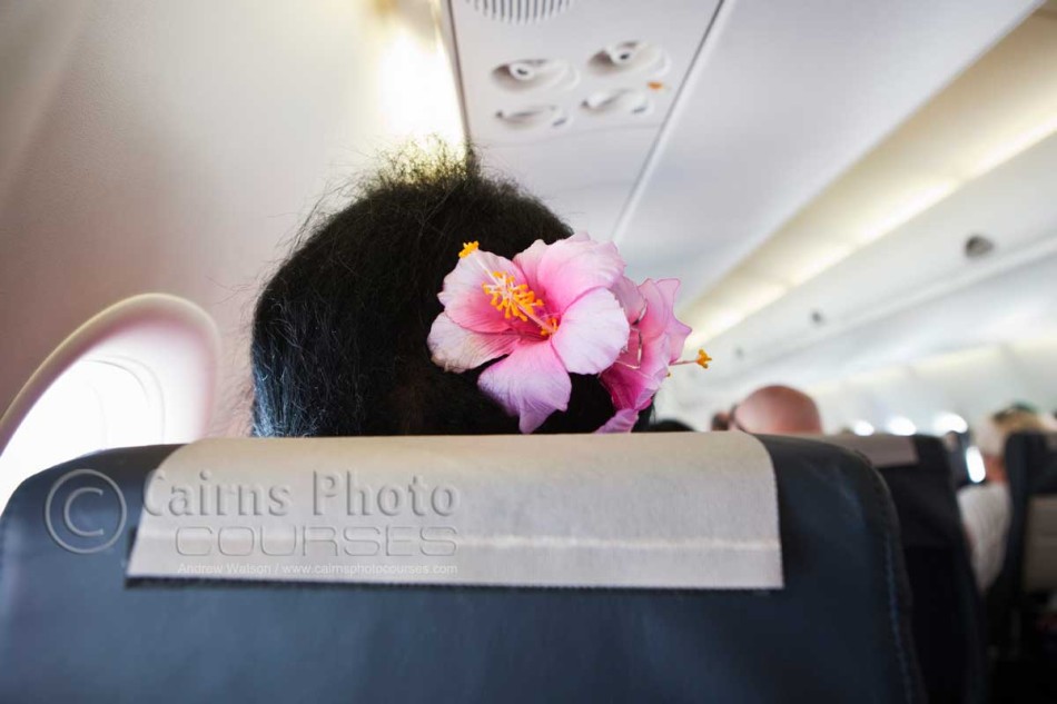 Image of Torres Strait Islander woman with iconic hibiscus flower in hair, Torres Strait Islands, North Queensland, Australia